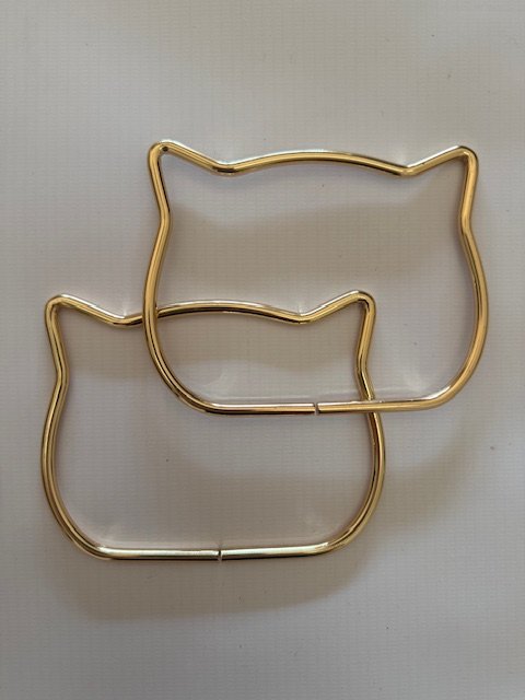 Par de Manijas - forma gatito - dorado rosé